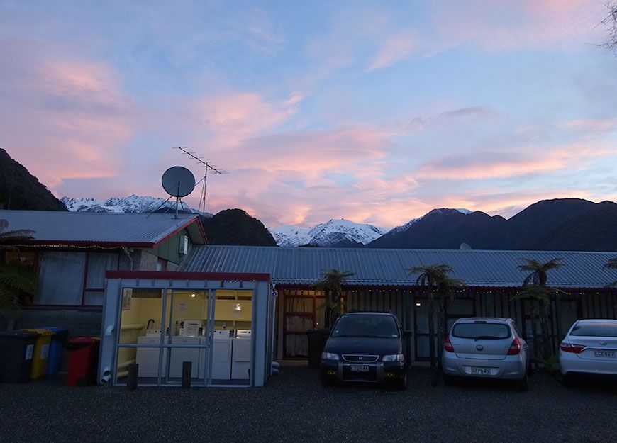 a sunset over the mountains